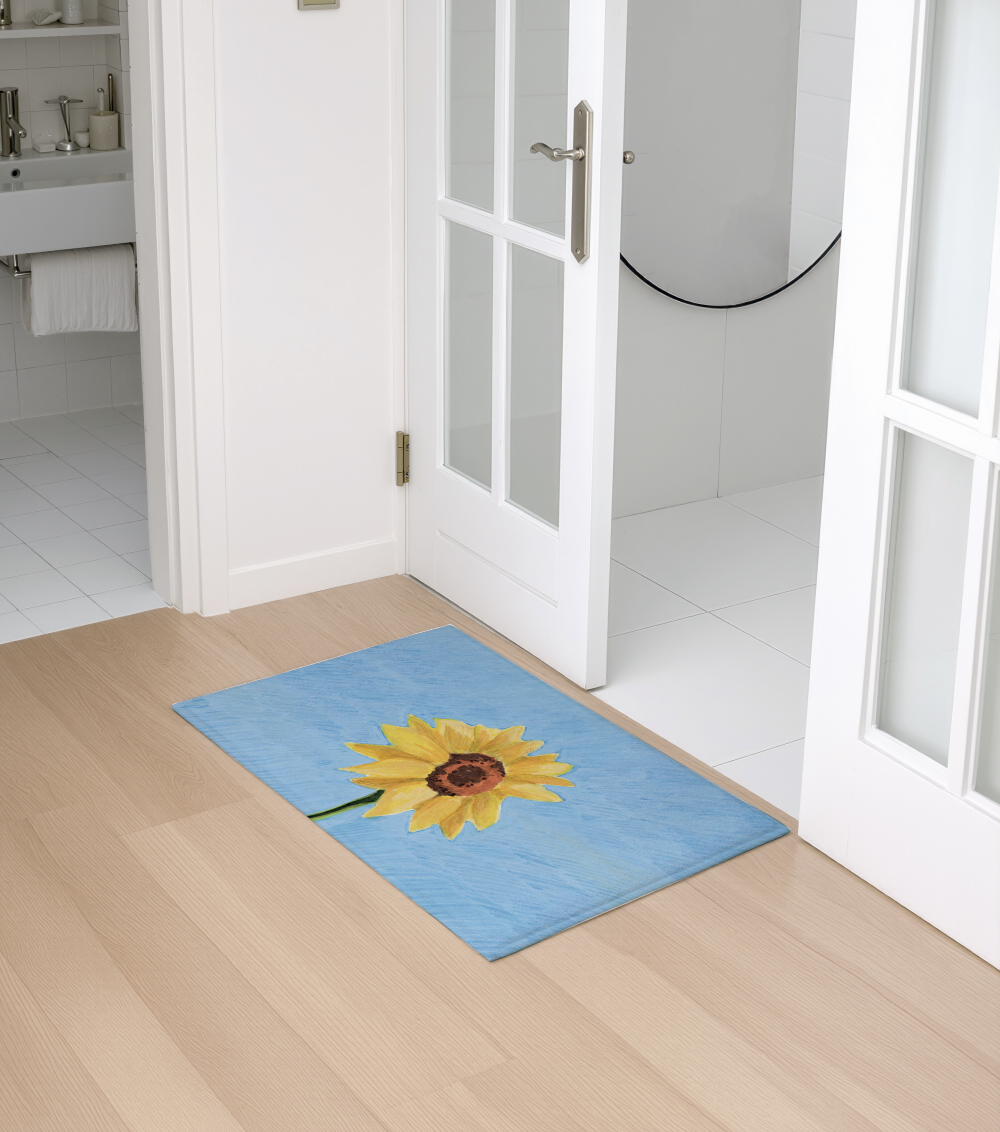현관에 있는 해바라기 발매트